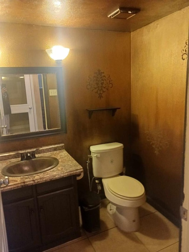 15907 Whispering Falls Ct, Houston, TX 77084 - bathroom with tile patterned flooring, toilet, and vanity