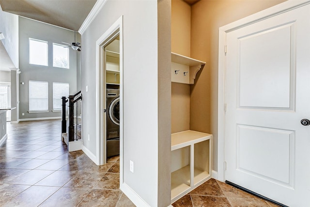mudroom with washer / dryer, crown molding, a ceiling fan, and baseboards