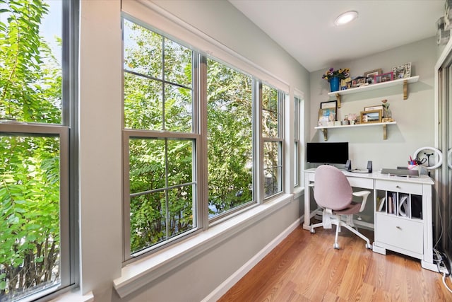 home office featuring recessed lighting, light wood-style floors, and baseboards