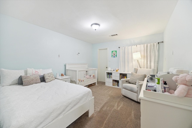 carpeted bedroom with visible vents