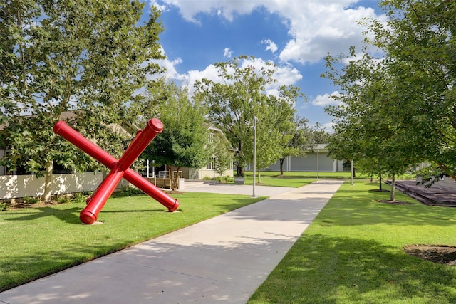 community play area featuring a lawn