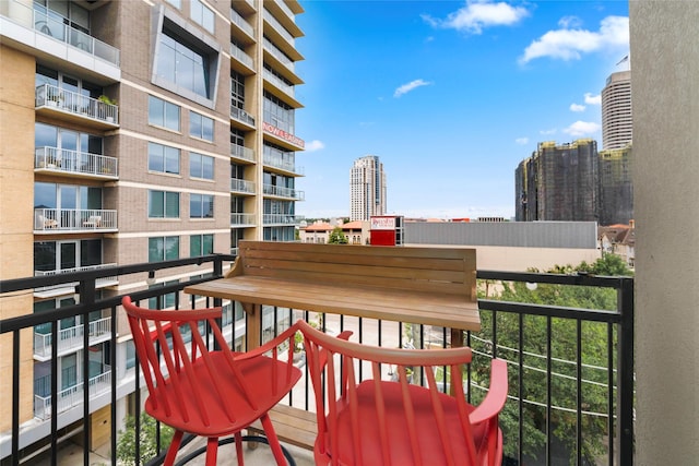 balcony featuring a view of city