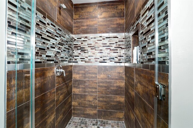 bathroom with a stall shower