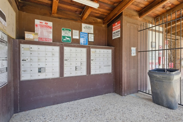 view of home's community featuring mail area