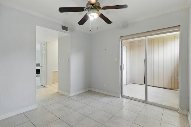 unfurnished room with visible vents, a ceiling fan, light tile patterned floors, crown molding, and baseboards