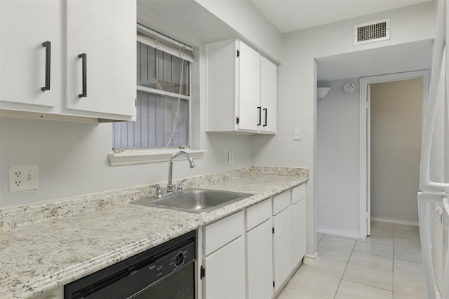 kitchen with white cabinets, a sink, light tile patterned flooring, visible vents, and black dishwasher