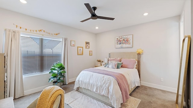 carpeted bedroom featuring recessed lighting, ceiling fan, and baseboards