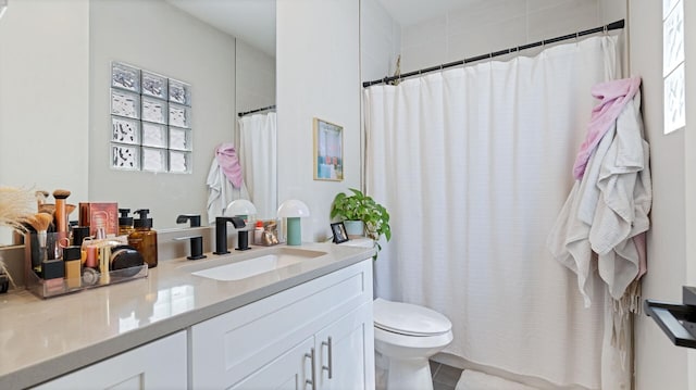 full bath with toilet, tile patterned floors, a shower with curtain, and vanity