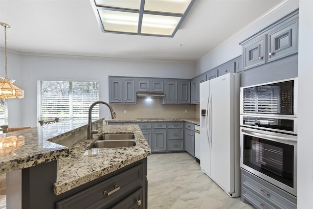 kitchen with marble finish floor, oven, under cabinet range hood, a sink, and white fridge with ice dispenser