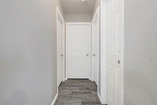 14147 Ballfour Park Ln, Houston, TX 77047 - hall featuring baseboards and wood finished floors