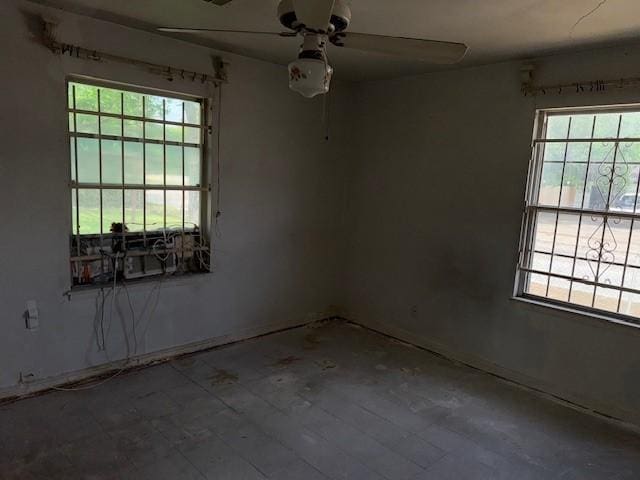 spare room with ceiling fan