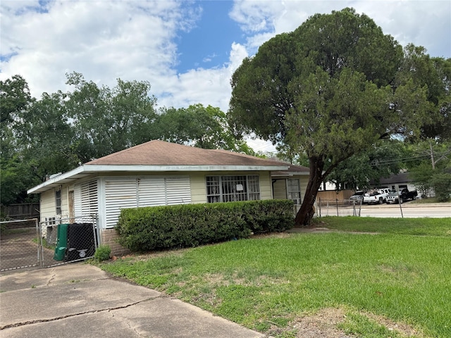 5500 Evergreen St, Houston, TX 77081 - view of home's exterior featuring a central air condition unit