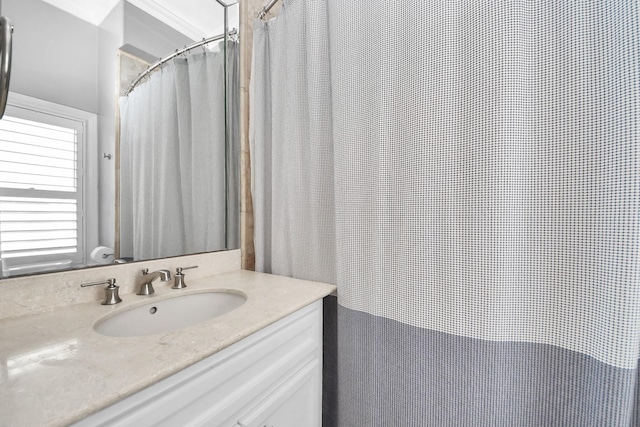 bathroom with vanity and a shower with curtain