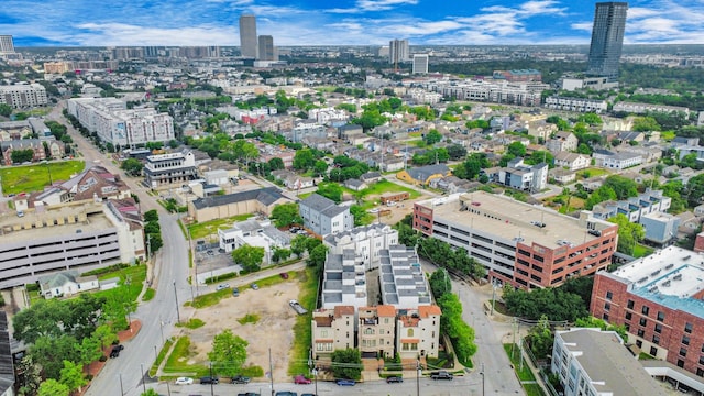drone / aerial view featuring a city view