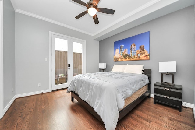 bedroom featuring baseboards, ornamental molding, wood finished floors, and access to exterior