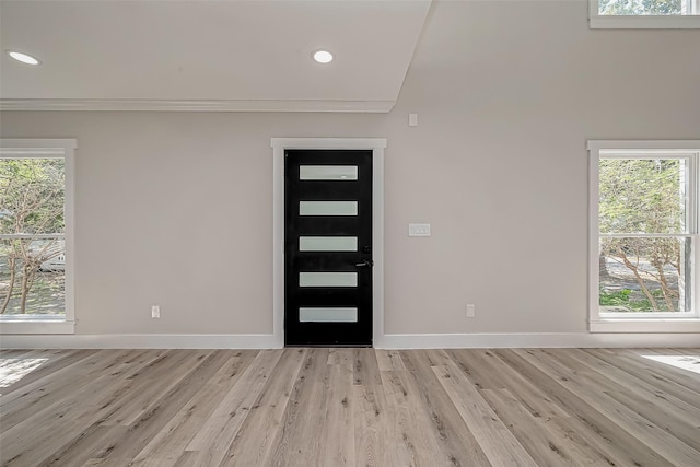 2102 Banks St, Houston, TX 77098 - entrance foyer featuring light wood finished floors, baseboards, recessed lighting, and ornamental molding