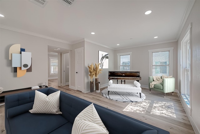 2102 Banks St, Houston, TX 77098 - bedroom featuring crown molding, multiple windows, visible vents, and light wood-style flooring