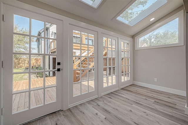 2102 Banks St, Houston, TX 77098 - entryway with baseboards, wood finished floors, lofted ceiling with skylight, and recessed lighting