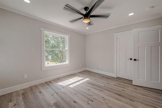 2102 Banks St, Houston, TX 77098 - unfurnished bedroom with recessed lighting, light wood-style flooring, baseboards, and ornamental molding