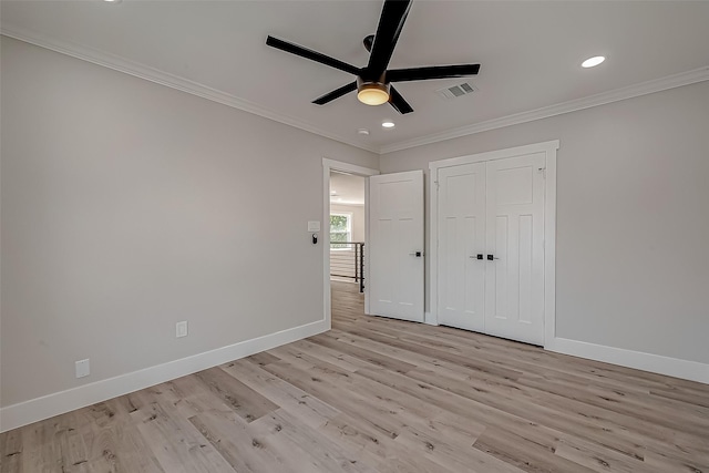 2102 Banks St, Houston, TX 77098 - unfurnished bedroom featuring crown molding, light wood-style flooring, baseboards, visible vents, and recessed lighting