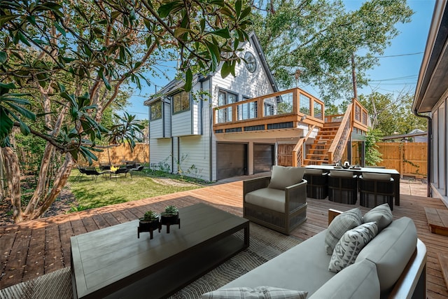 2102 Banks St, Houston, TX 77098 - deck featuring fence, an attached garage, an outdoor hangout area, and stairs