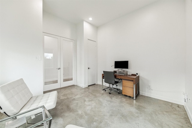 office with concrete flooring, baseboards, recessed lighting, and french doors