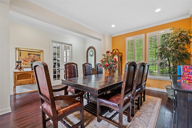 dining room with plenty of natural light, baseboards, and dark wood-type flooring