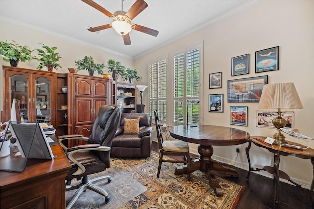 office area featuring ornamental molding, baseboards, wood finished floors, and ceiling fan