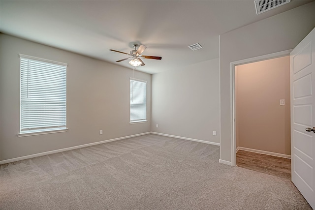 2128 Port Jackson, Texas City, TX 77568 - unfurnished room featuring ceiling fan, carpet floors, and baseboards