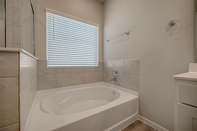 2128 Port Jackson, Texas City, TX 77568 - full bathroom with a bath, baseboards, and tile patterned flooring