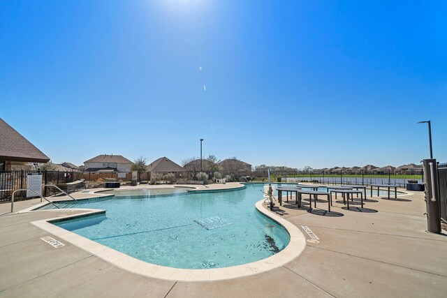32610 Dew Crest St, Brookshire, TX 77423 - community pool featuring fence, a residential view, and a patio