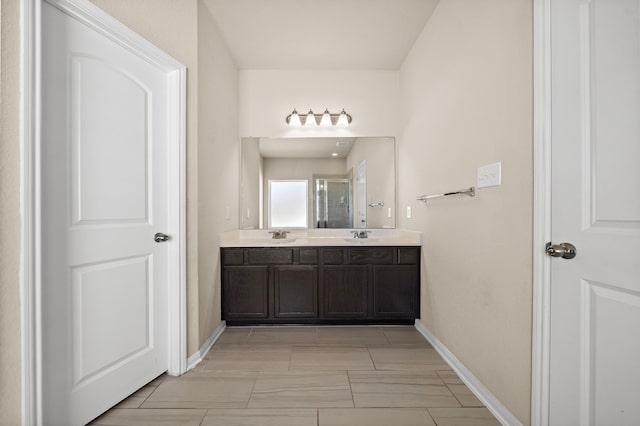 32610 Dew Crest St, Brookshire, TX 77423 - full bathroom featuring baseboards, a sink, double vanity, and a stall shower