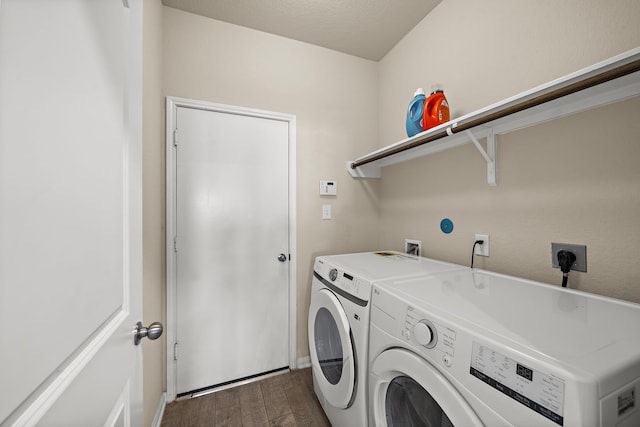 32610 Dew Crest St, Brookshire, TX 77423 - laundry area with baseboards, dark wood-style floors, washer and dryer, and laundry area