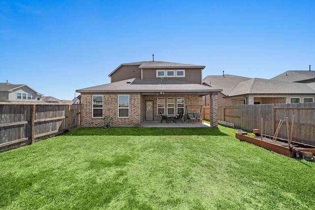 32610 Dew Crest St, Brookshire, TX 77423 - rear view of property with a fenced backyard, brick siding, a patio area, a shingled roof, and a yard