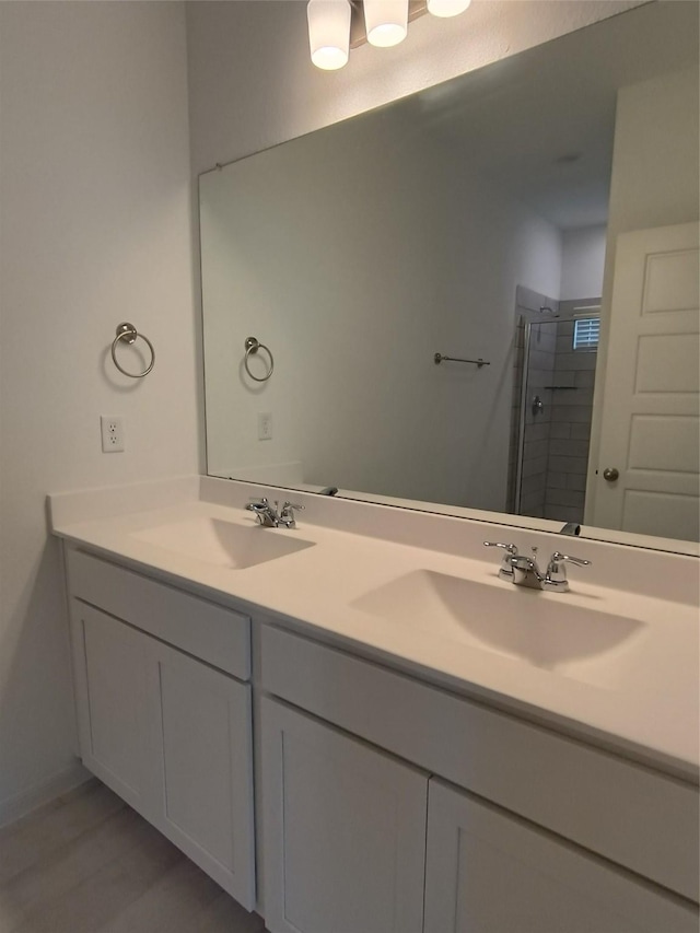 12367 Sterling Oak, Humble, TX 77044 - bathroom with a stall shower and double vanity