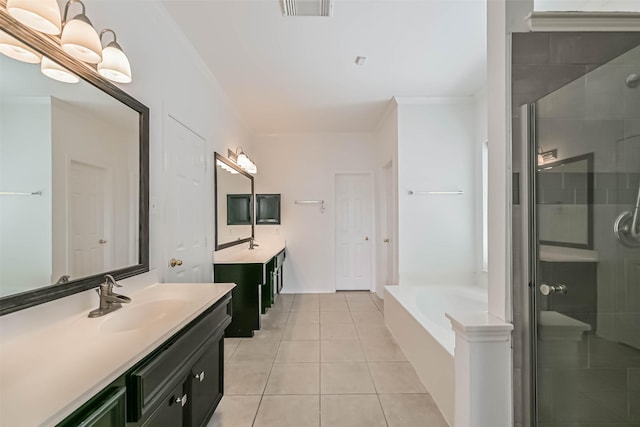 bathroom with crown molding, tile patterned floors, a stall shower, and a sink