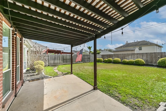 view of patio / terrace with a fenced backyard and a pergola