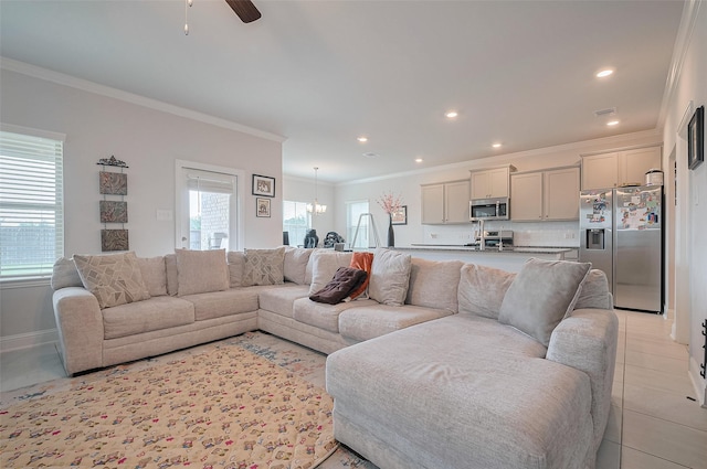 452 Long Beach Bay Dr, Katy, TX 77493 - living area featuring crown molding, a ceiling fan, recessed lighting, a chandelier, and light tile patterned floors