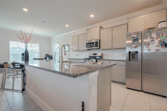 452 Long Beach Bay Dr, Katy, TX 77493 - kitchen with stainless steel appliances, light tile patterned flooring, gray cabinetry, crown molding, and recessed lighting