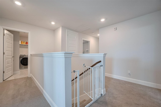 452 Long Beach Bay Dr, Katy, TX 77493 - hall featuring washer / dryer, carpet flooring, an upstairs landing, baseboards, and recessed lighting