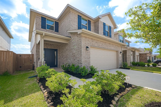 452 Long Beach Bay Dr, Katy, TX 77493 - view of front of property with an attached garage, concrete driveway, brick siding, and a gate