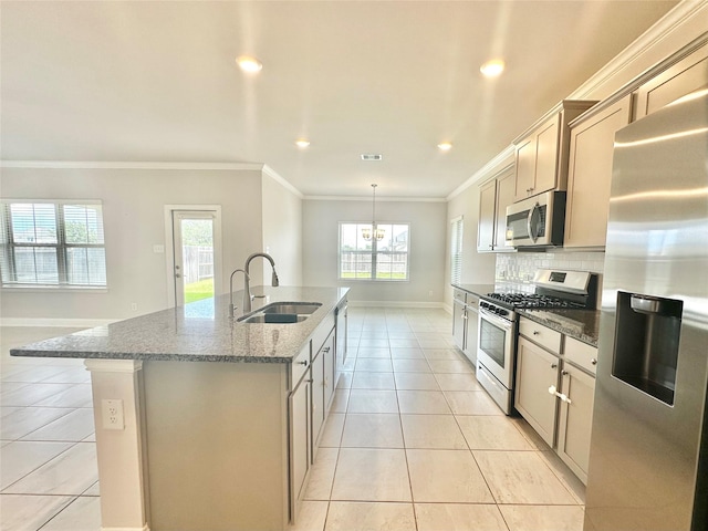 452 Long Beach Bay Dr, Katy, TX 77493 - kitchen featuring stainless steel appliances, a kitchen island with sink, recessed lighting, healthy amount of natural light, and light tile patterned flooring