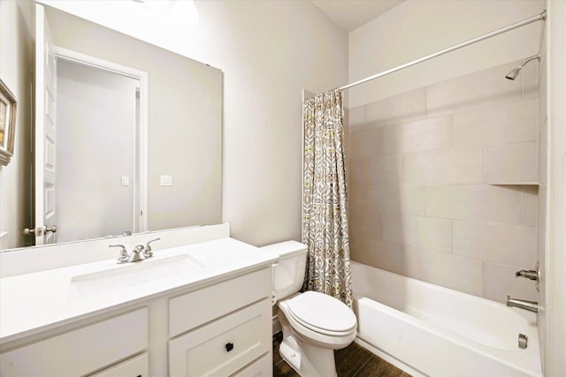 full bath featuring vanity, shower / bath combo, toilet, and wood finished floors