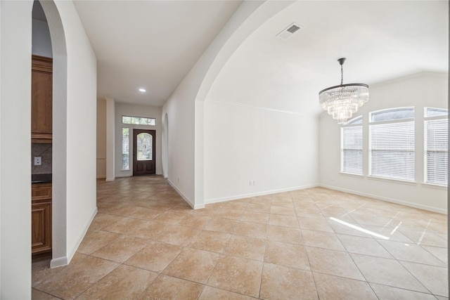 25630 Creston Meadow Dr, Richmond, TX 77406 - foyer with arched walkways, baseboards, visible vents, an inviting chandelier, and light tile patterned floors