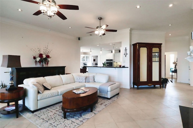 living room featuring a ceiling fan, ornamental molding, light tile patterned floors, and recessed lighting