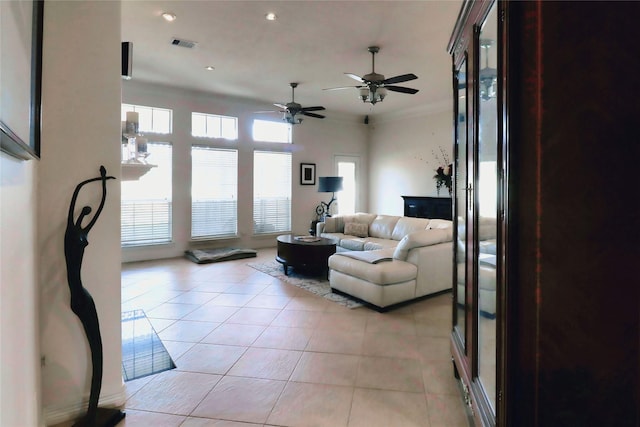 living room with light tile patterned floors, ceiling fan, and recessed lighting