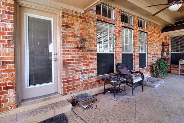 view of patio featuring a ceiling fan