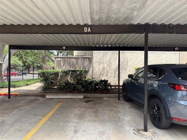 5711 Sugar Hill Dr Unit 62, Houston, TX 77057 - covered parking lot with fence
