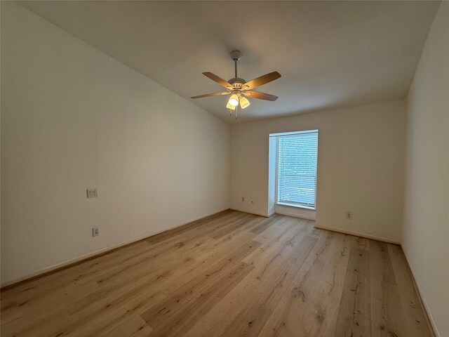 5711 Sugar Hill Dr Unit 62, Houston, TX 77057 - empty room with ceiling fan, baseboards, and light wood finished floors