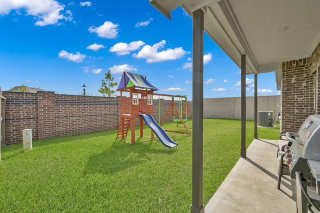 view of play area with a fenced backyard, central air condition unit, a patio area, and a lawn